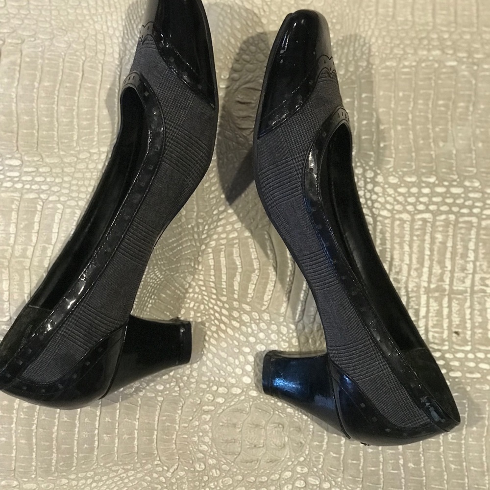 Grey and black heels.